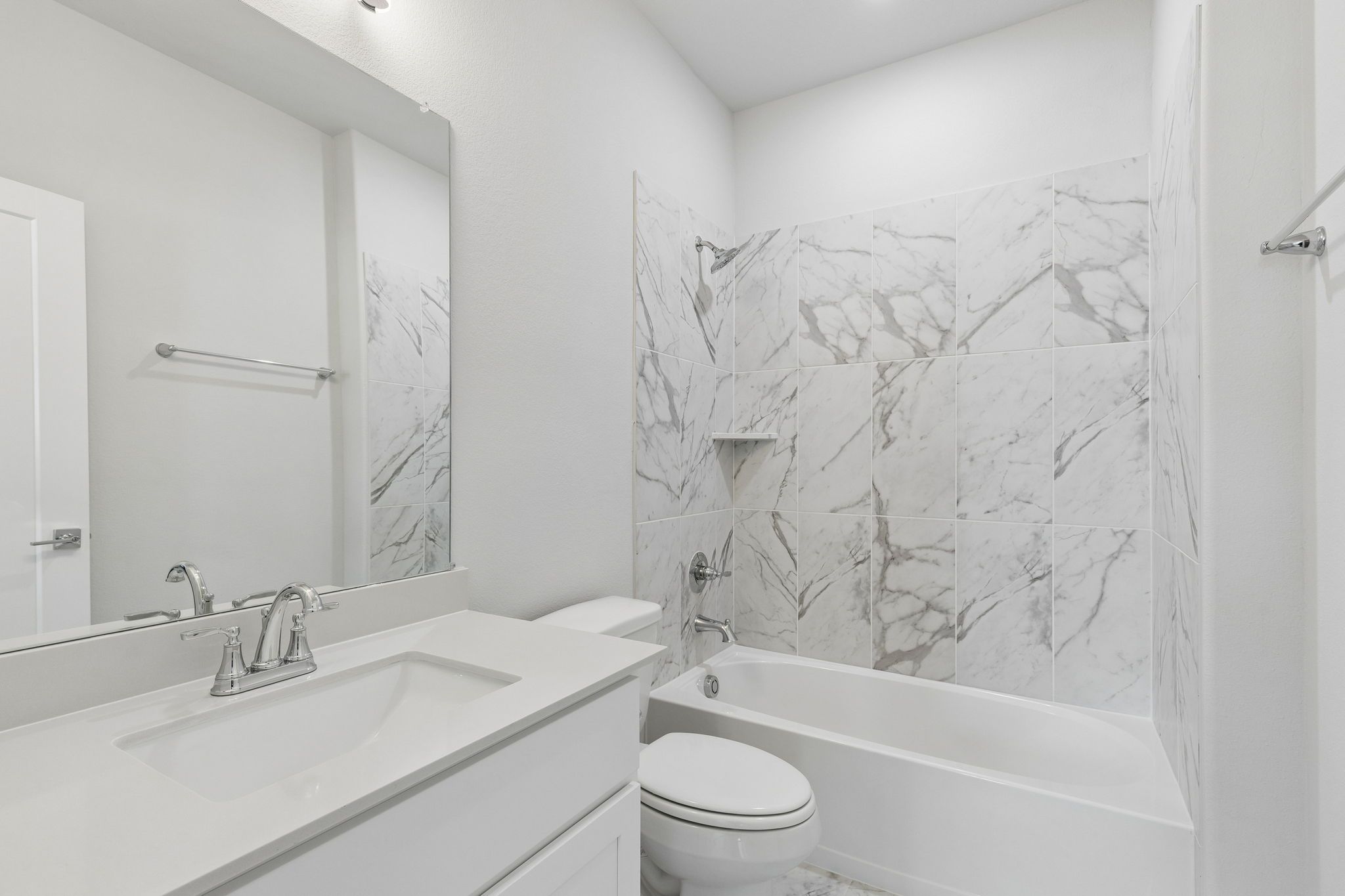 Bathroom in the Winters home plan by Trophy Signature Homes – REPRESENTATIVE PHOTO
