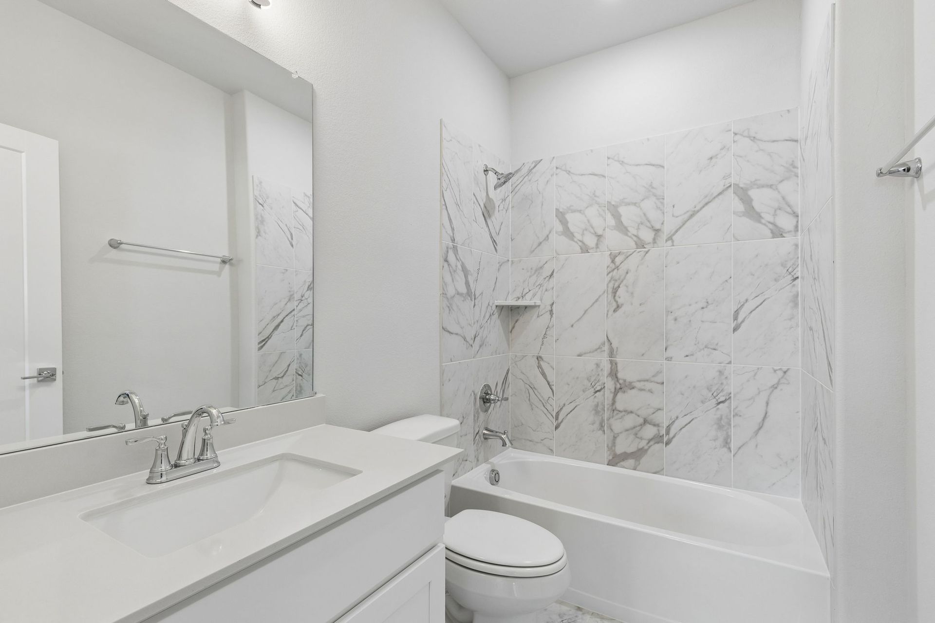 Bathroom in the Winters home plan by Trophy Signature Homes – REPRESENTATIVE PHOTO