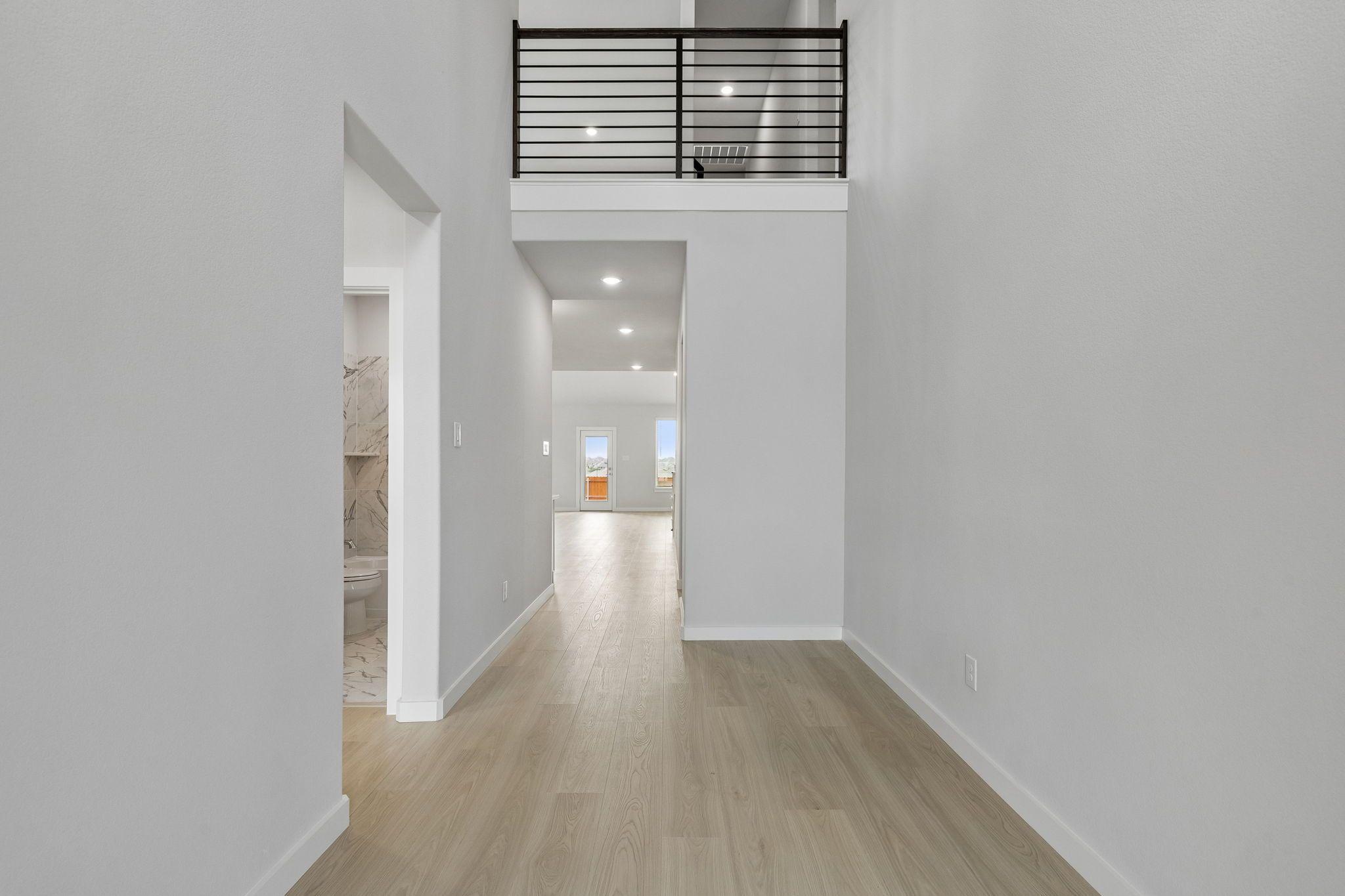 Entry in the Winters home plan by Trophy Signature Homes – REPRESENTATIVE PHOTO