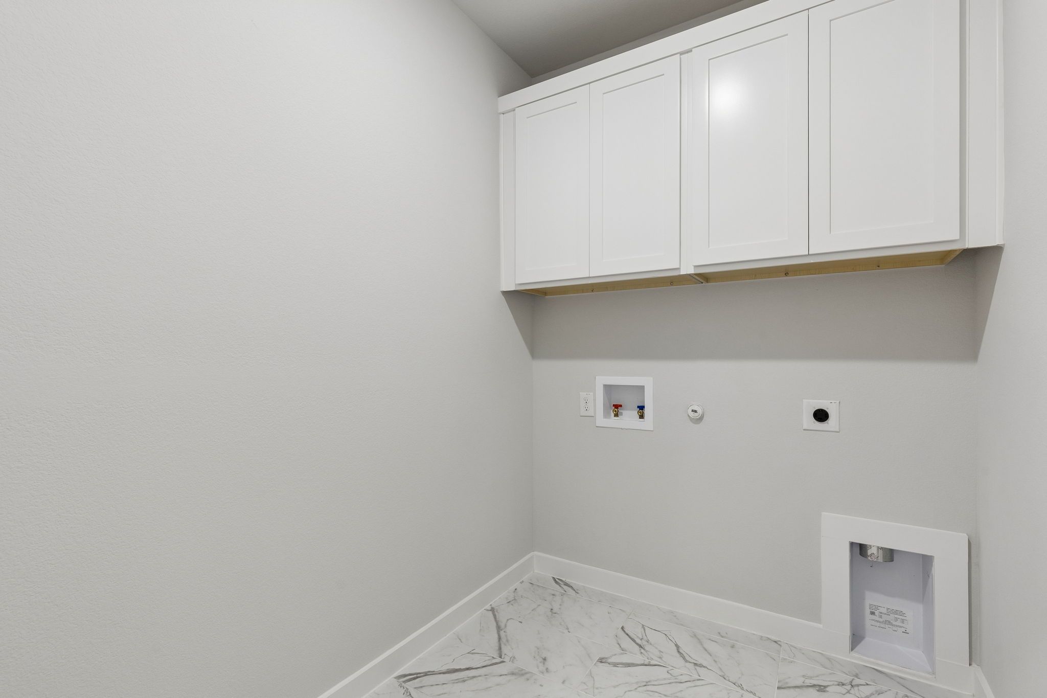 Utility Room in the Winters home plan by Trophy Signature Homes – REPRESENTATIVE PHOTO