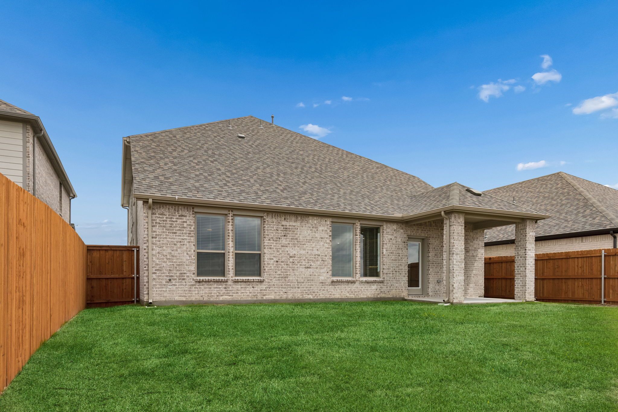 Covered Patio in the Winters home plan by Trophy Signature Homes – REPRESENTATIVE PHOTO