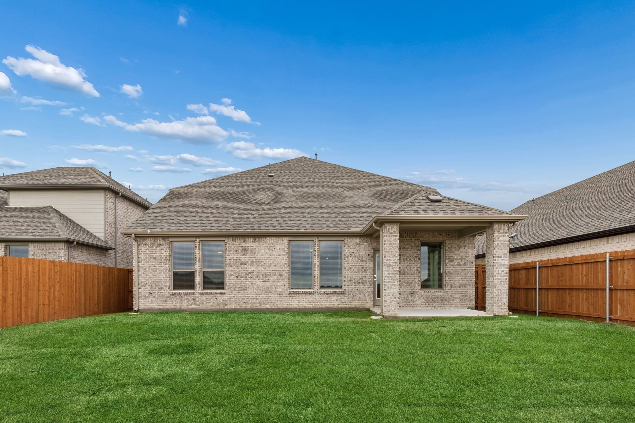 Covered Patio in the Winters home plan by Trophy Signature Homes – REPRESENTATIVE PHOTO