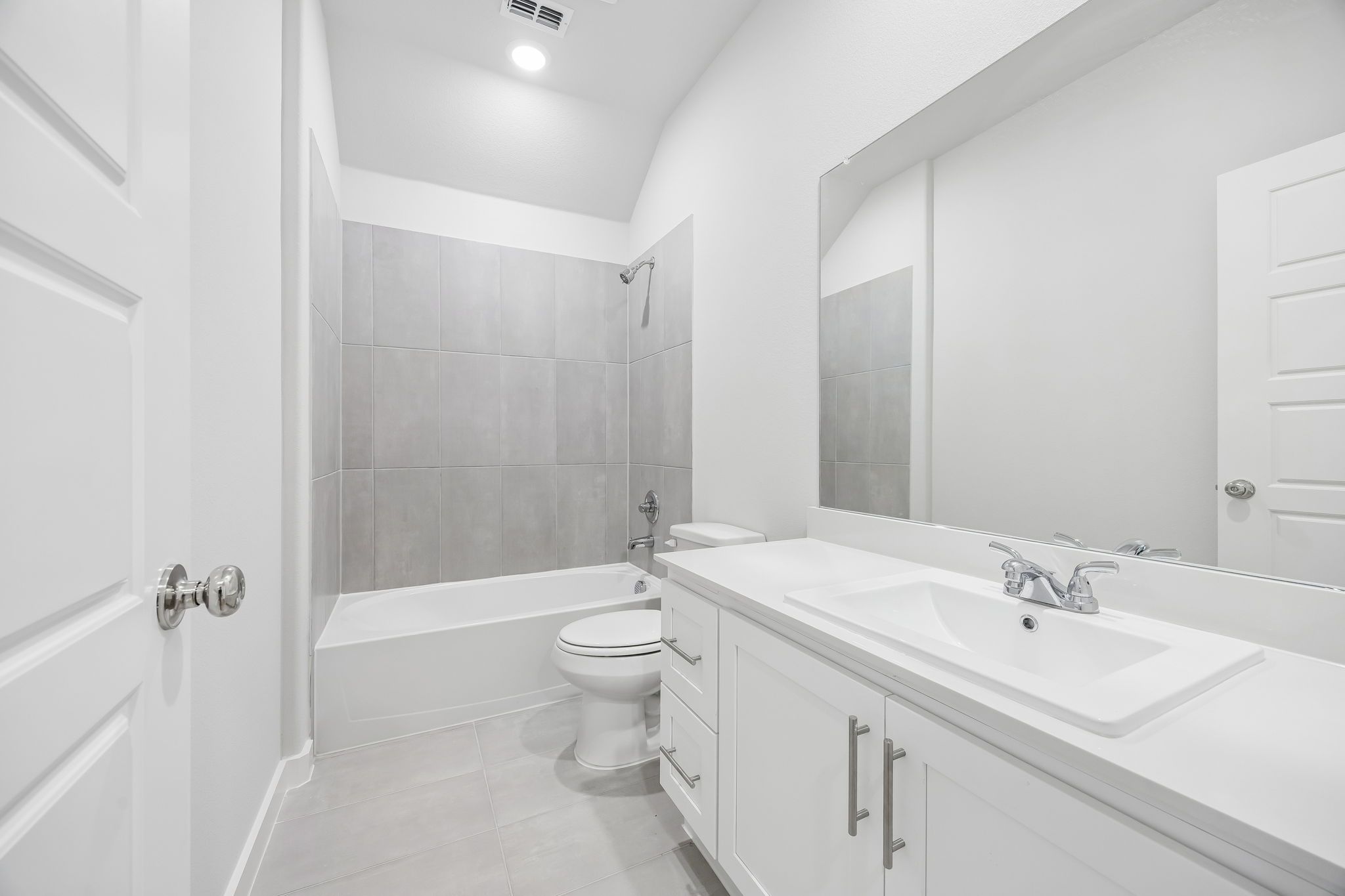 Secondary bathroom in the Heisman by Trophy Signature Homes – REPRESENTATIVE PHOTO