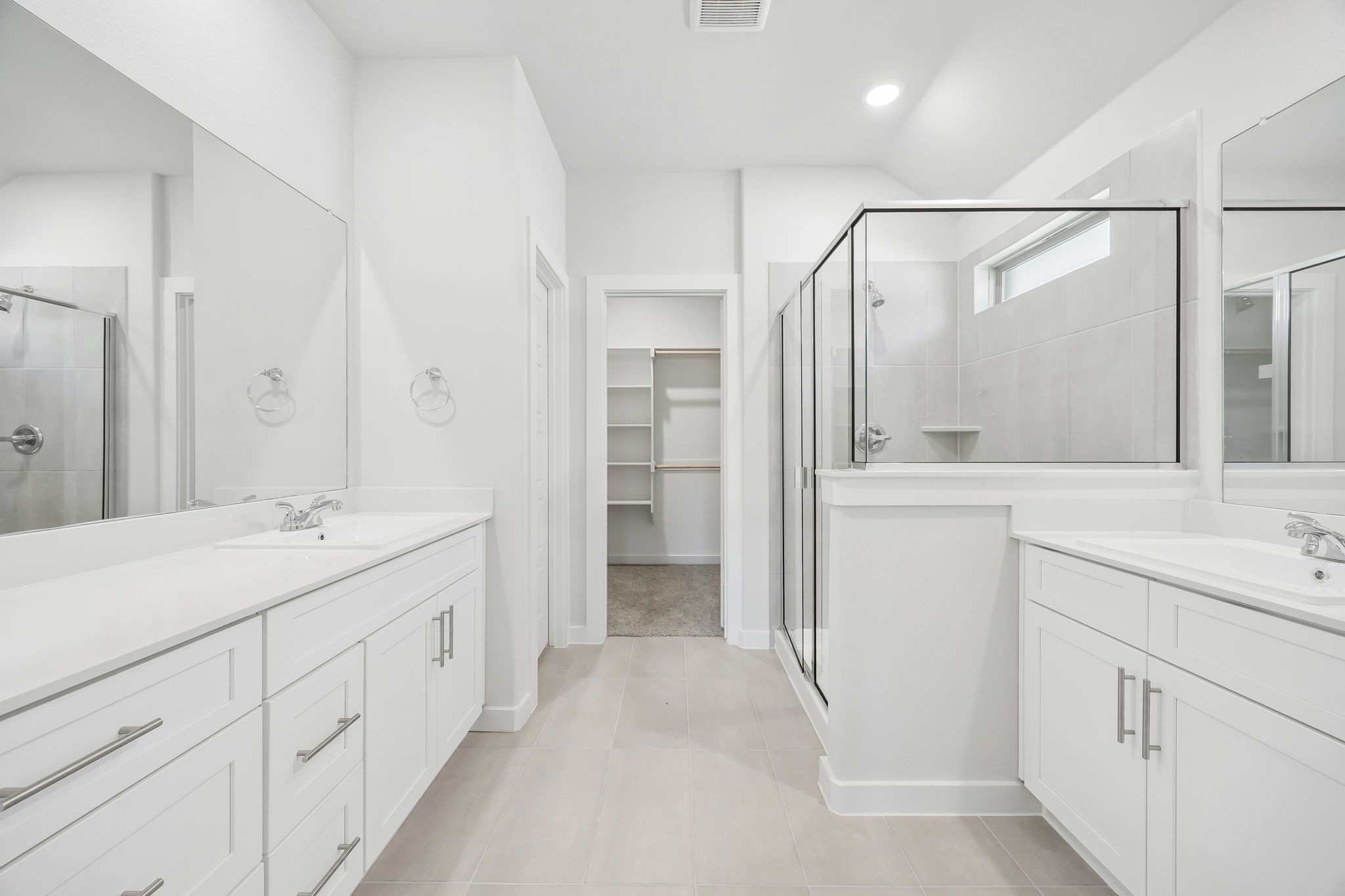 Primary bathroom in the Heisman home plan by Trophy Signature Homes – REPRESENTATIVE PHOTO