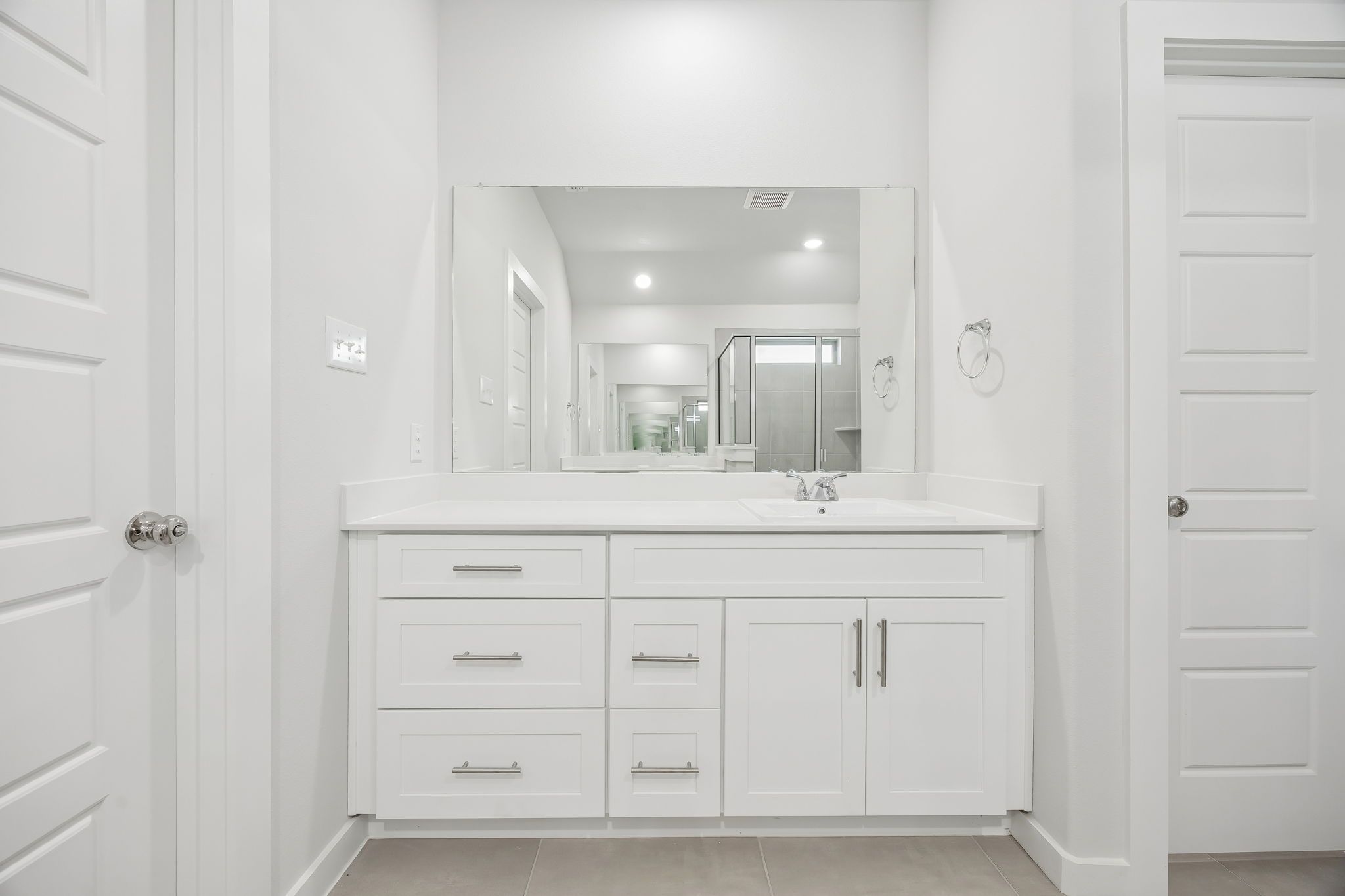 Primary bathroom in the Heisman home plan by Trophy Signature Homes – REPRESENTATIVE PHOTO