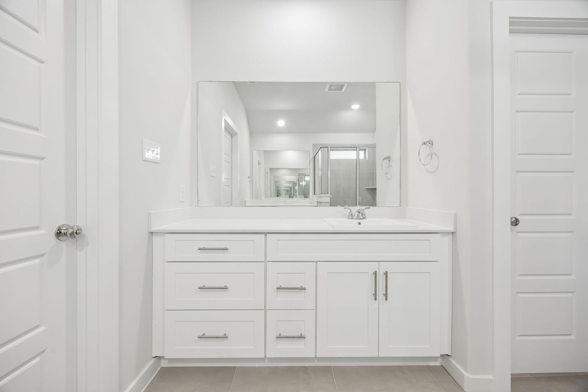 Primary bathroom in the Heisman home plan by Trophy Signature Homes – REPRESENTATIVE PHOTO