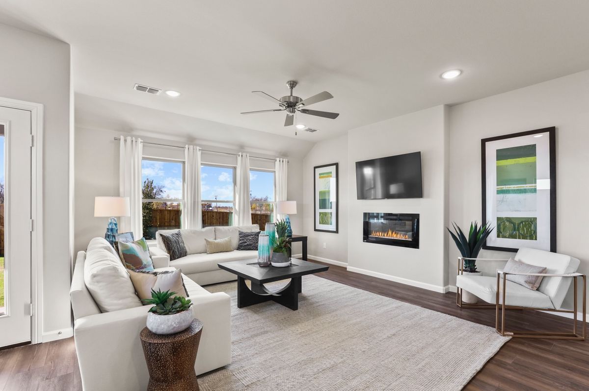 Living Room in the Heisman home plan by Trophy Signature Homes – REPRESENTATIVE PHOTO