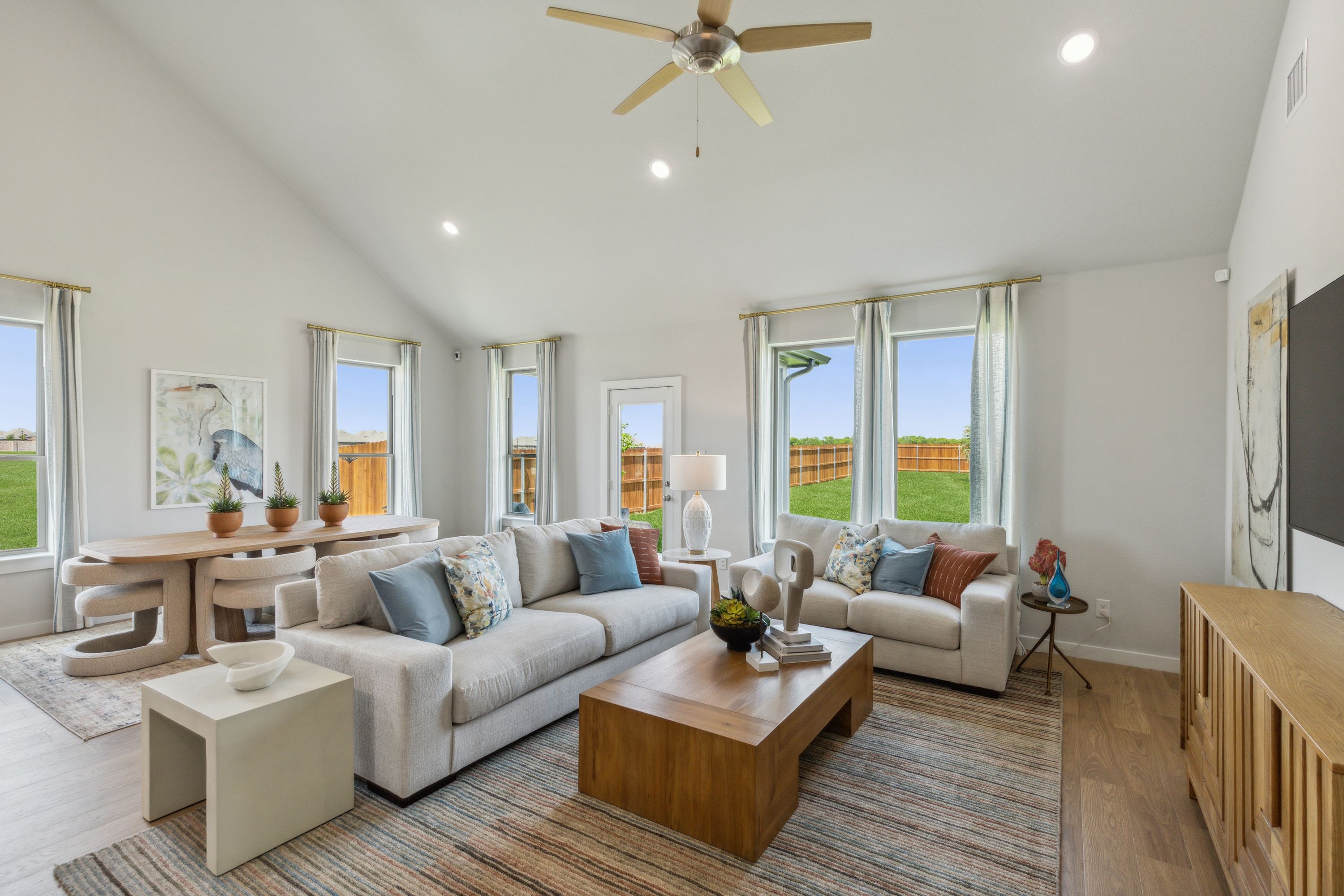 Living Room in a Windmore new Winters Model in Princeton TX by Trophy Signature Homes