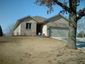 casa en True Construction and Design por True Construction and Design