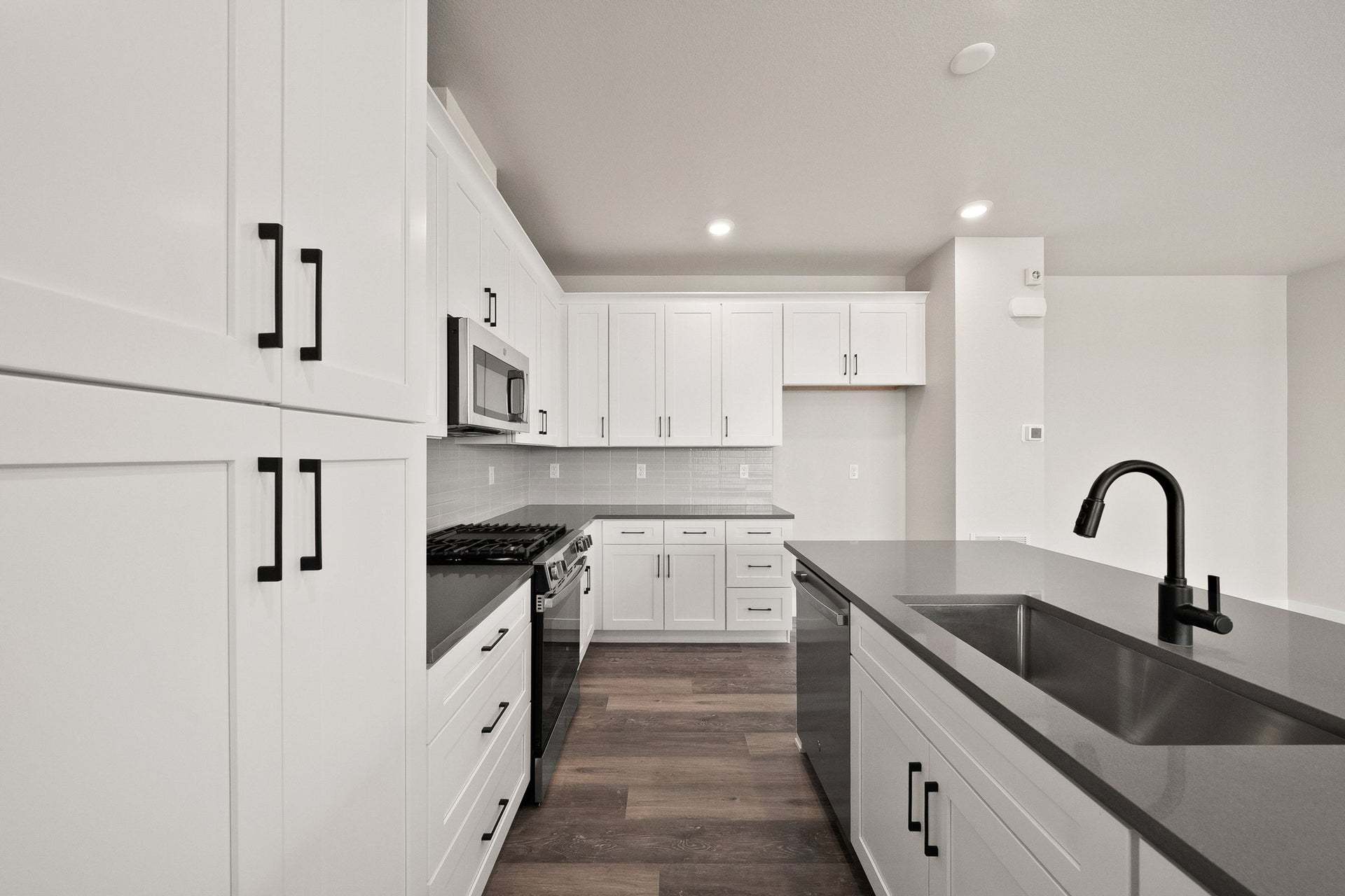 8741 Whiteclover Street | Duet at Sterling Ranch by Trumark Homes | Plan 2 | Kitchen