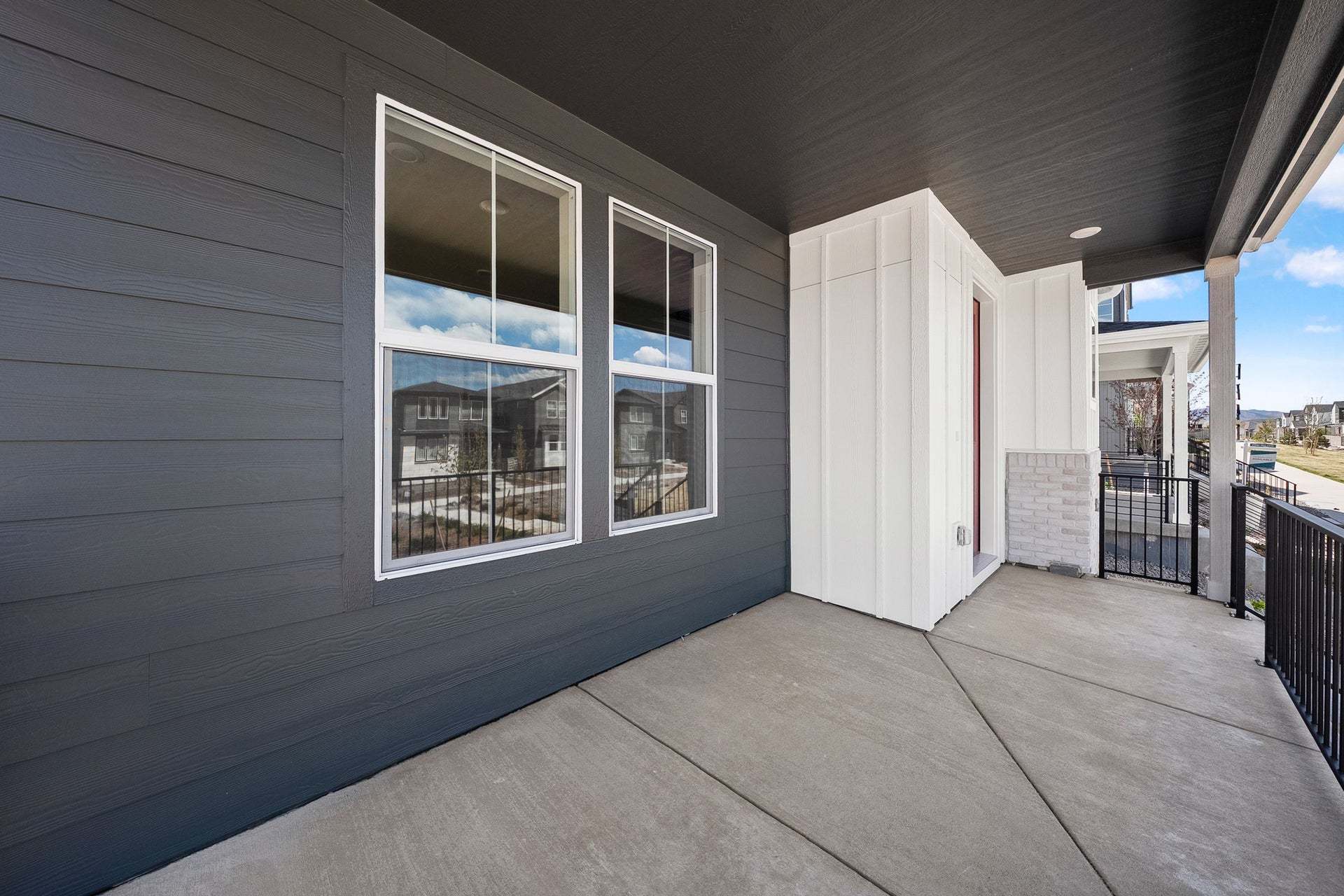 8741 Whiteclover Street | Duet at Sterling Ranch by Trumark Homes | Plan 2 | Covered Porch