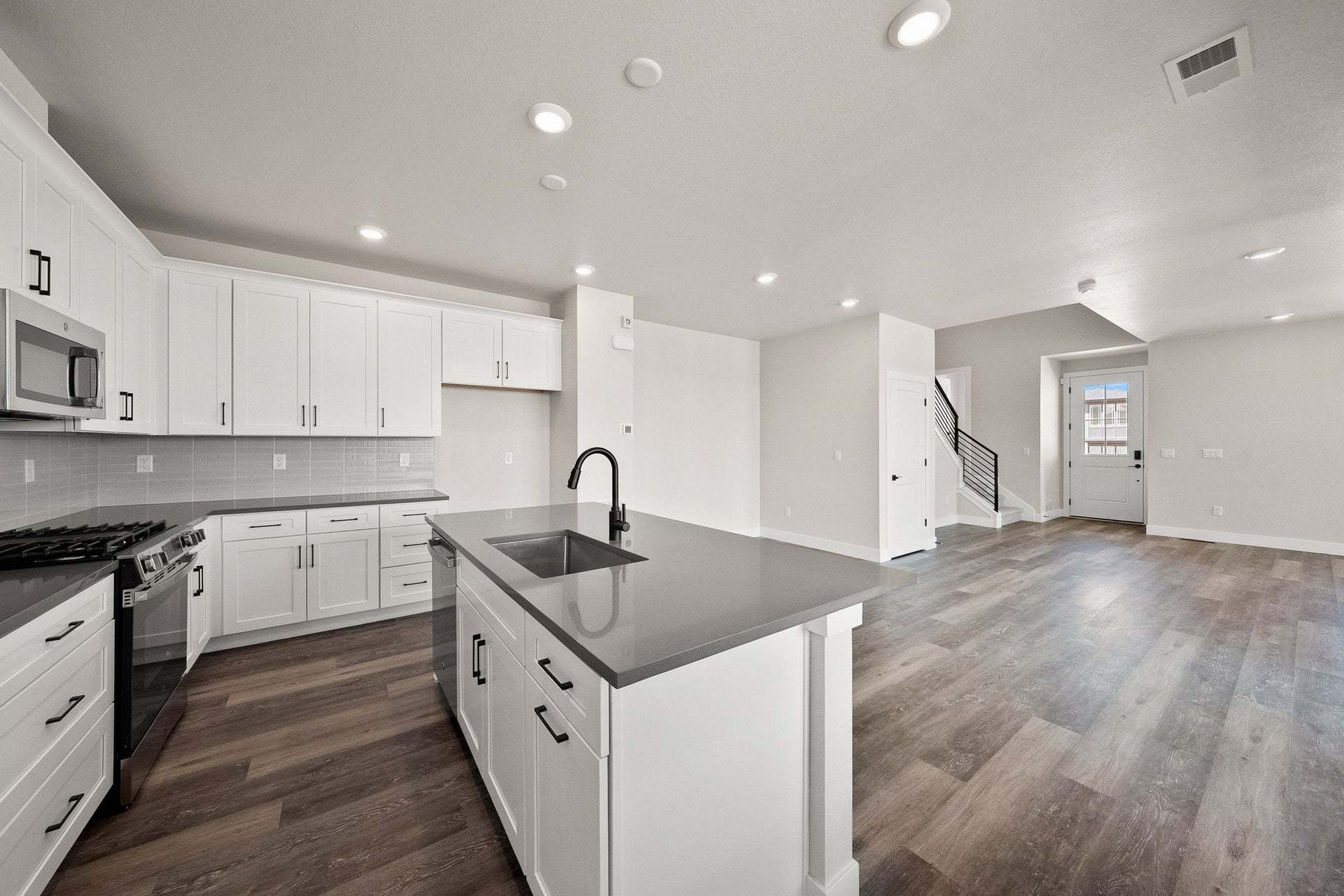 8741 Whiteclover Street | Duet at Sterling Ranch by Trumark Homes | Plan 2 | Kitchen Great Room