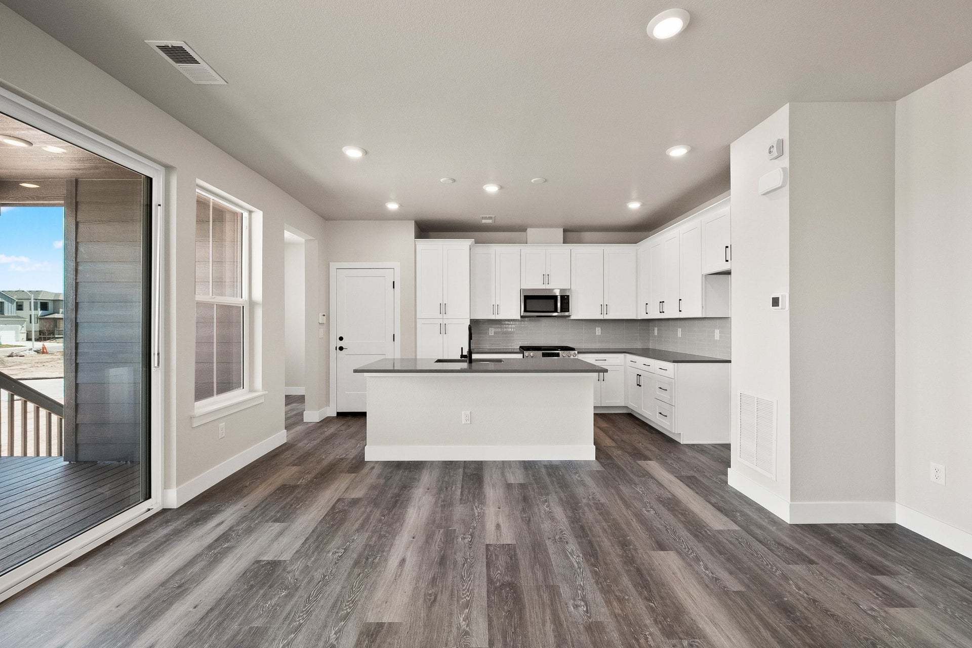 8741 Whiteclover Street | Duet at Sterling Ranch by Trumark Homes | Plan 2 | Kitchen Dining