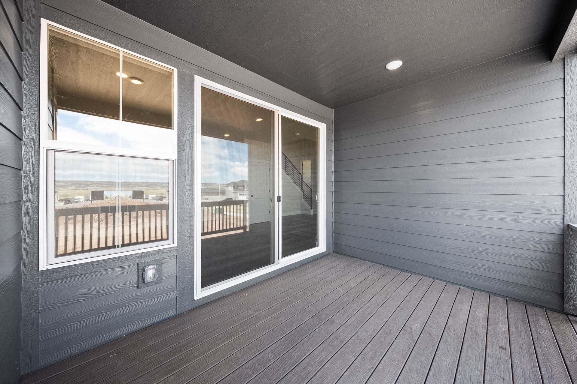 8741 Whiteclover Street | Duet at Sterling Ranch by Trumark Homes | Plan 2 | Covered Outdoor Room