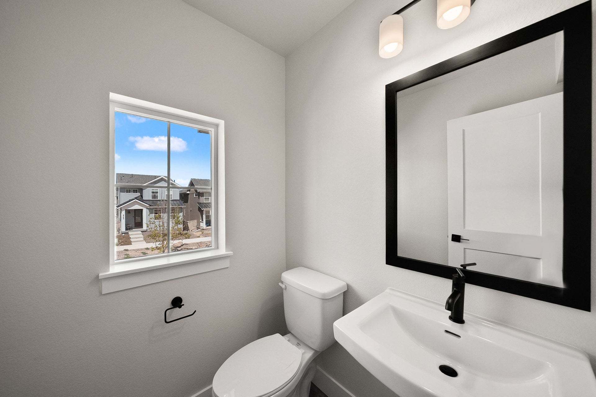 8741 Whiteclover Street | Duet at Sterling Ranch by Trumark Homes | Plan 2 | Powder Bath