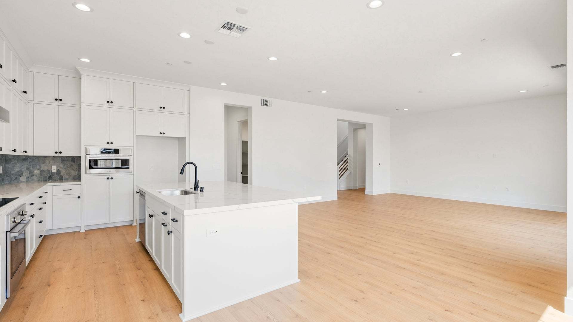 Apricot Estates by Trumark Homes in Brentwood, CA I Lot 44 I Kitchen and Family Room