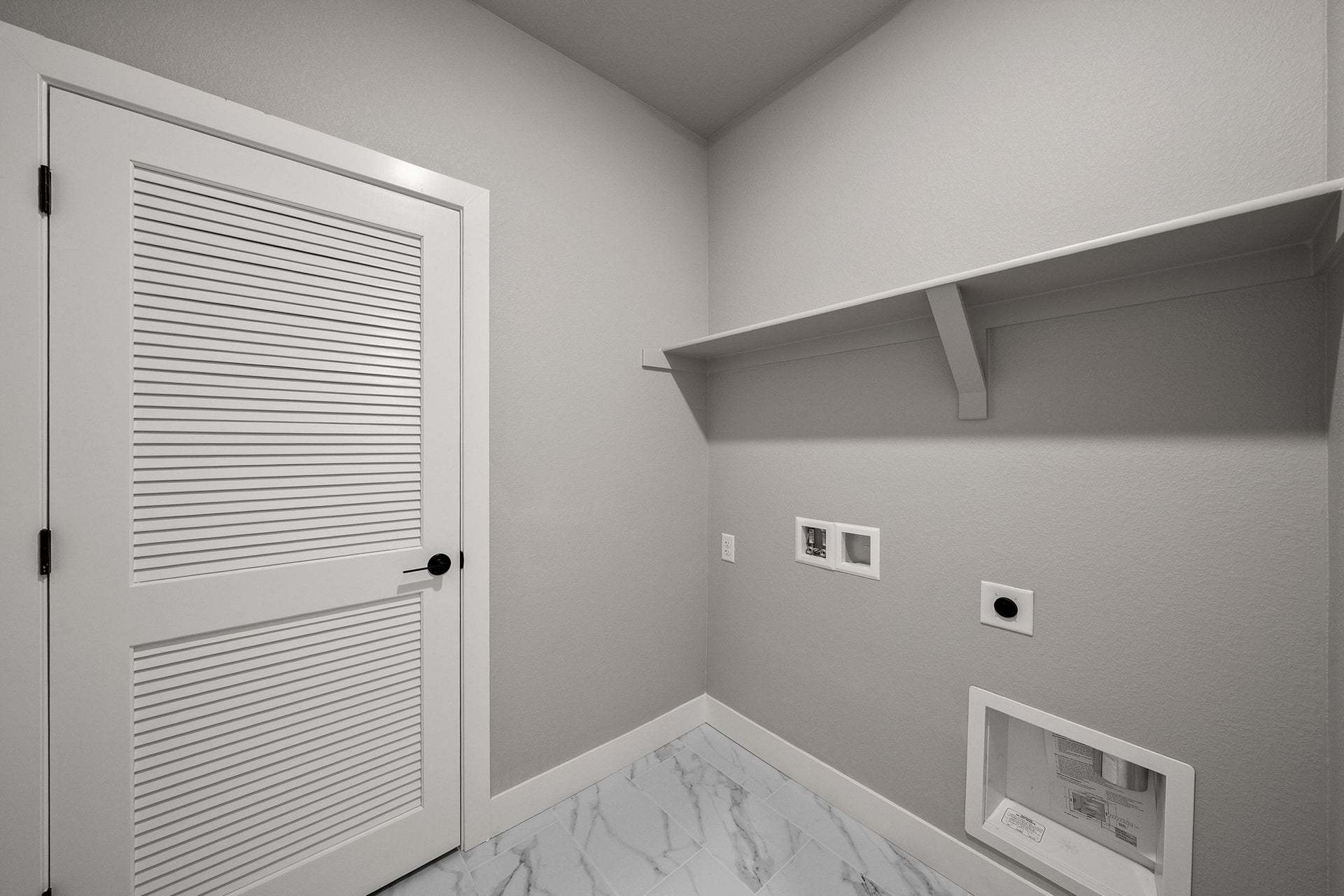 2898 W 56th Avenue | Berkeley Villas in Denver| Plan 1 | Laundry