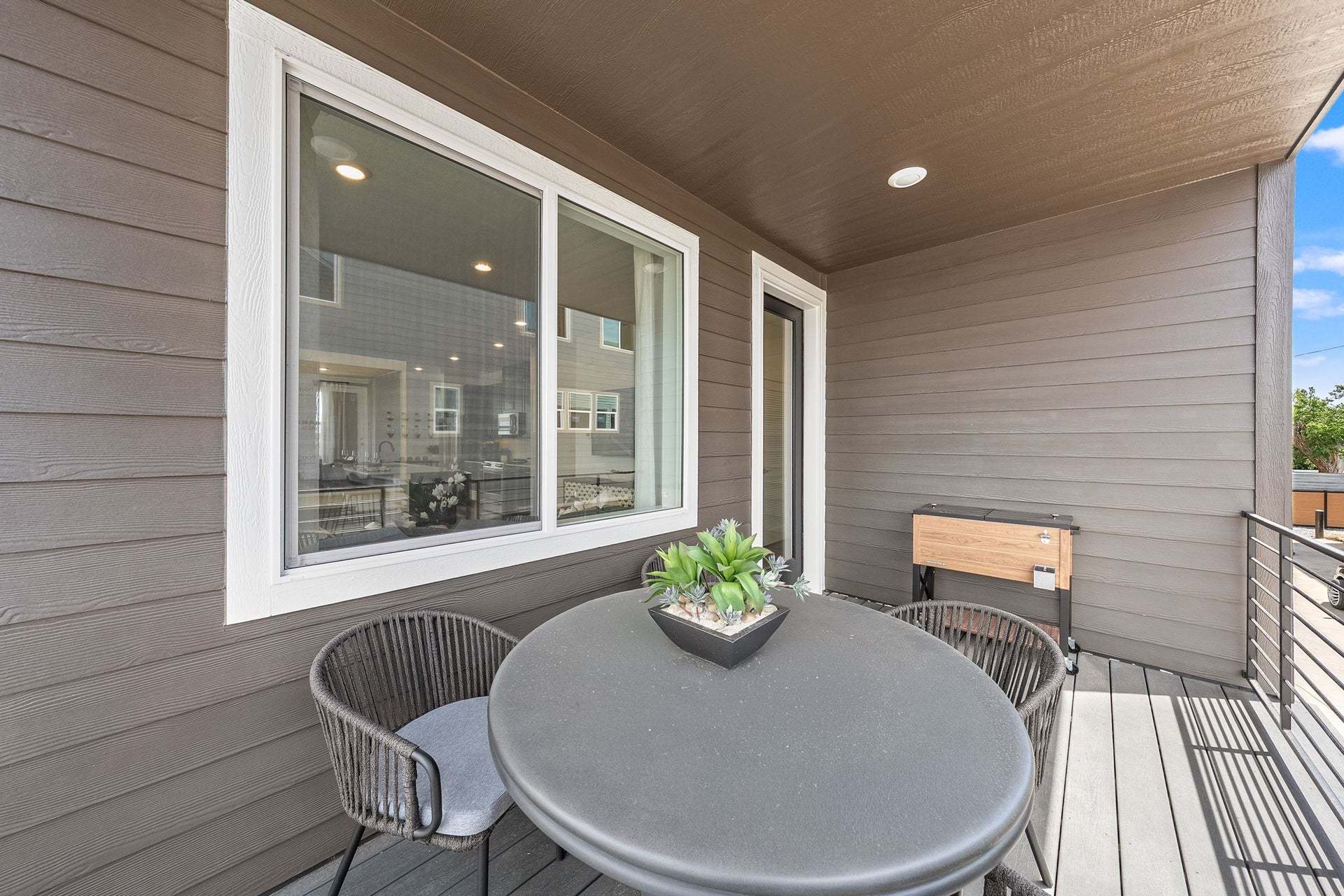 Berkeley Villas by Trumark Homes in Denver, CO | Plan 3 Model | Covered Deck