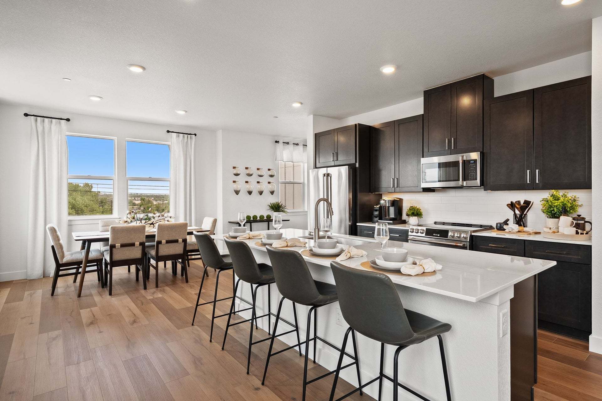 Berkeley Villas by Trumark Homes in Denver, CO | Plan 3 Model | Kitchen Dining