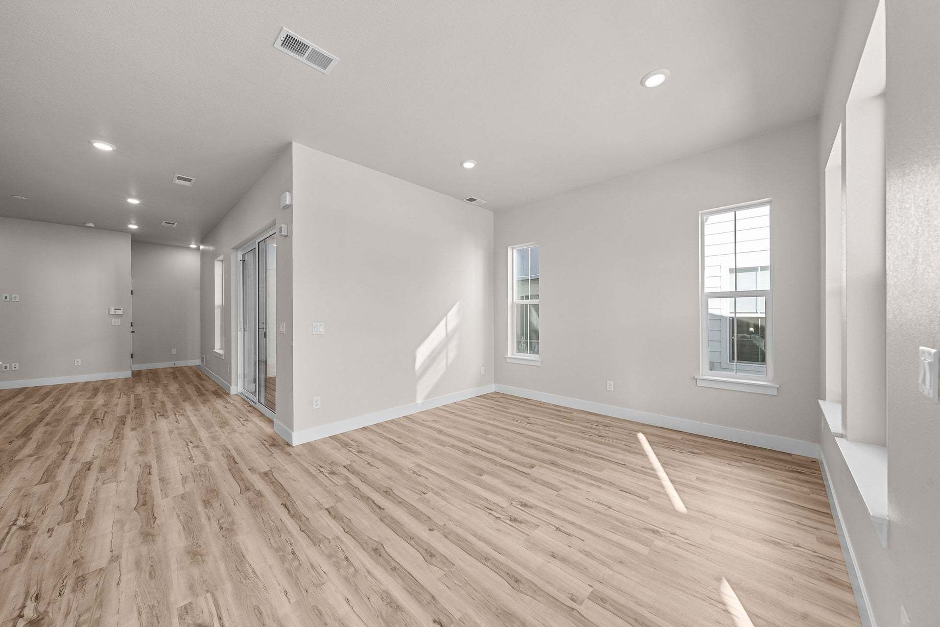 Duet at Sterling Ranch | Plan 1 | Great Room | Representative Photo