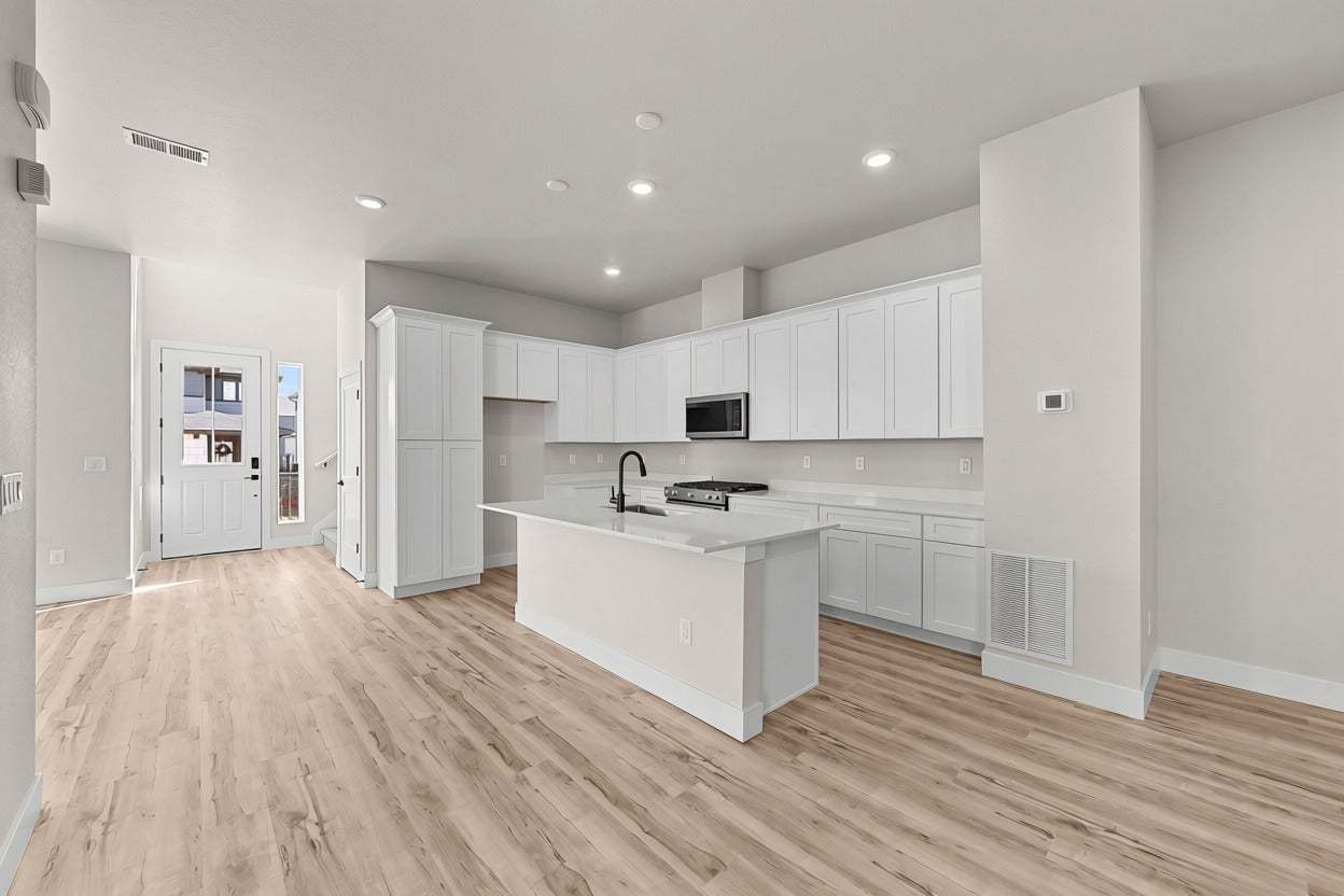 Duet at Sterling Ranch | Plan 1 | Kitchen |  Representative Photo