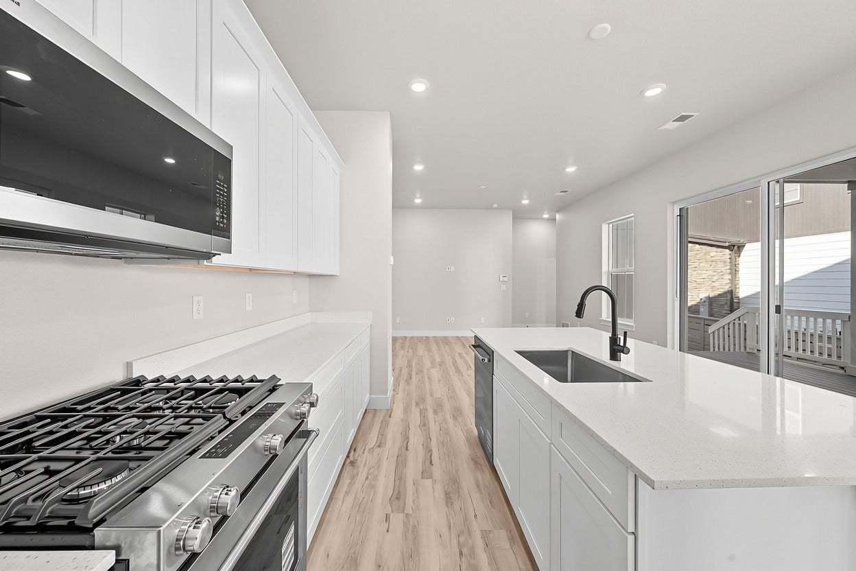 Duet at Sterling Ranch | Plan 1 | Kitchen | Representative Photo