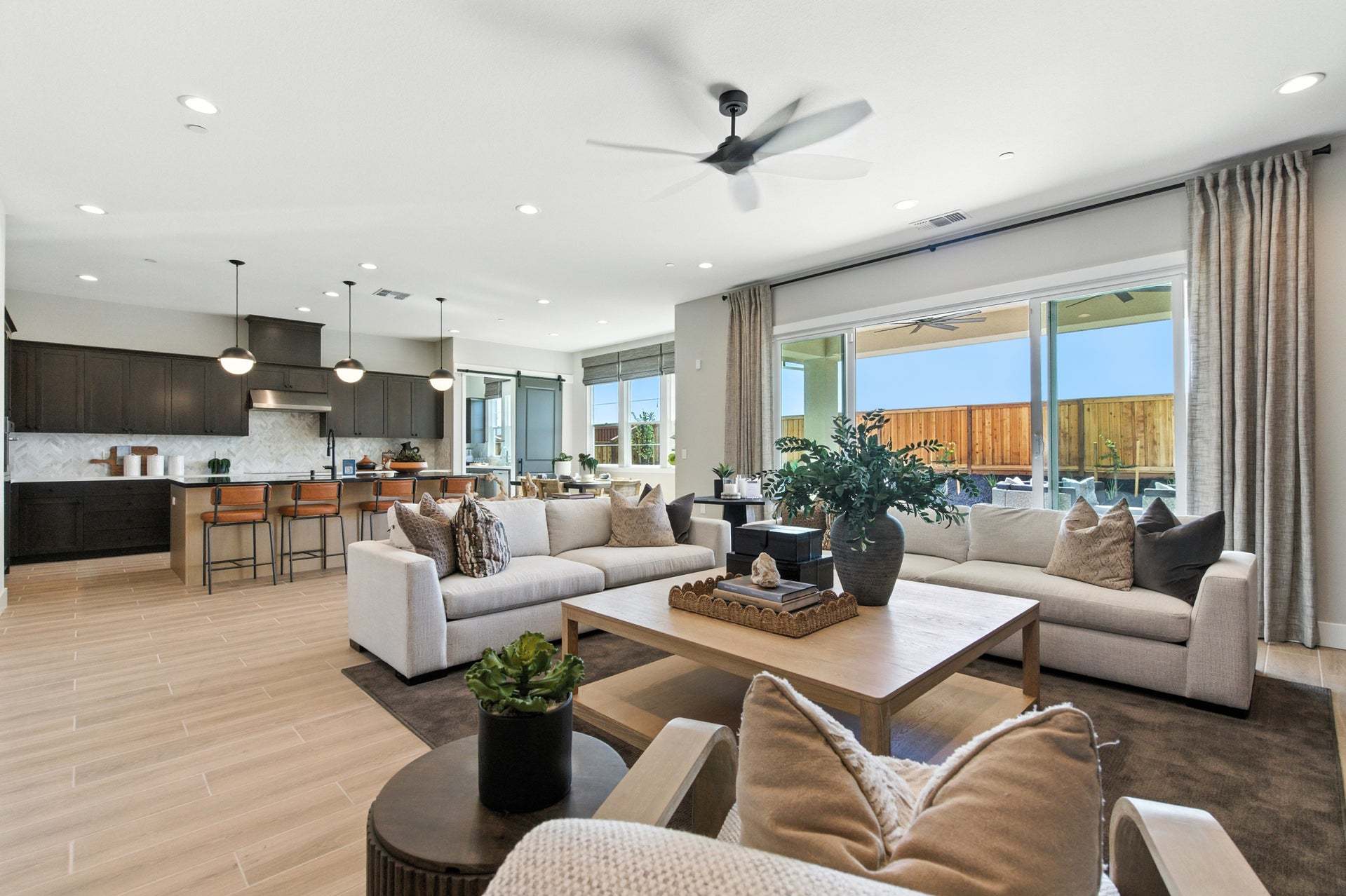 Apricot Estates by Trumark Homes in Brentwood, CA I Residence 3 Model I Great Room and Kitchen