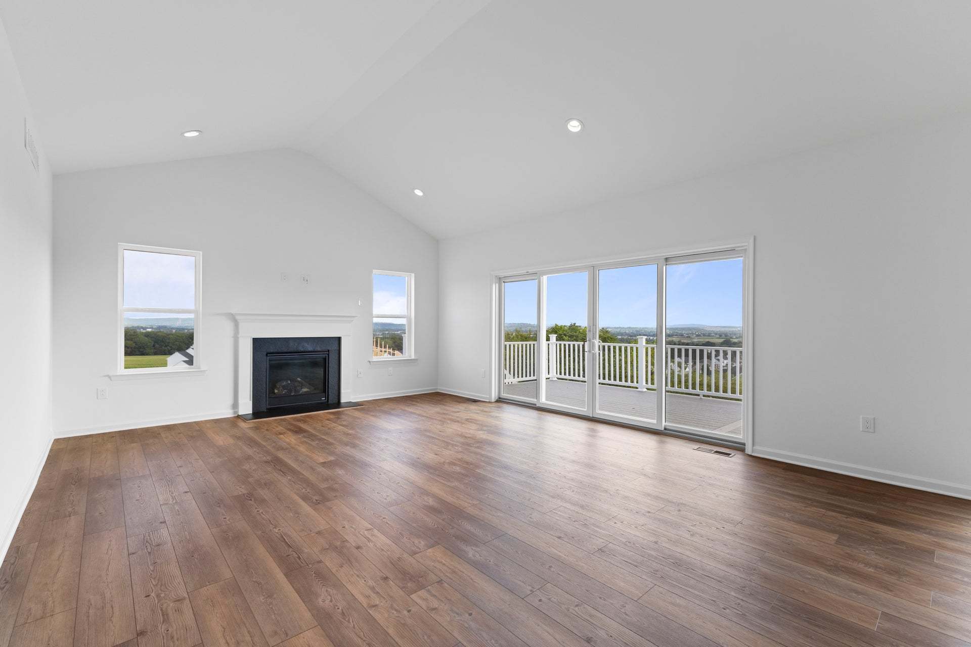 Rockford Great Room with Optional Fireplace Window Package and Added Sliding Glass Doors