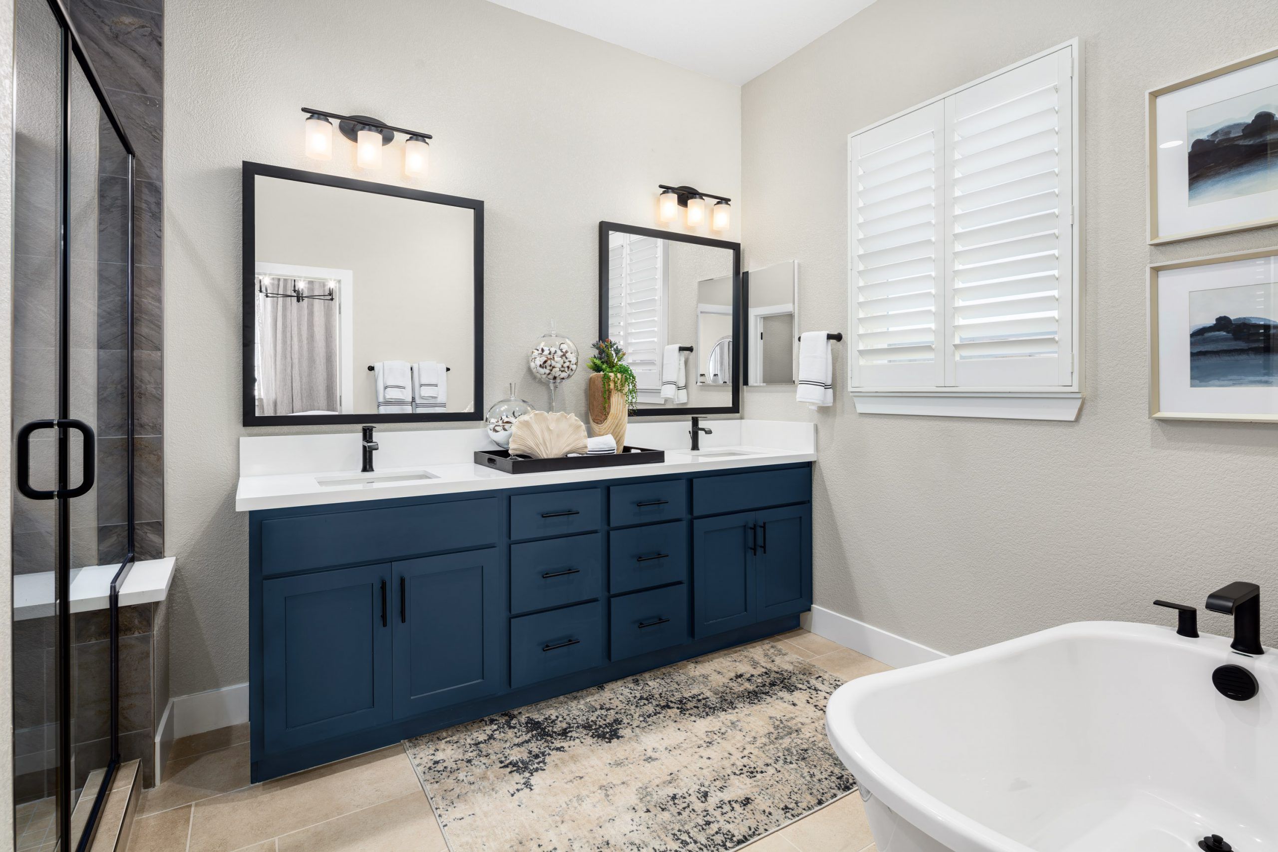 Primary Bathroom with Dual-Sink Vanity and Free-Standing Tub 