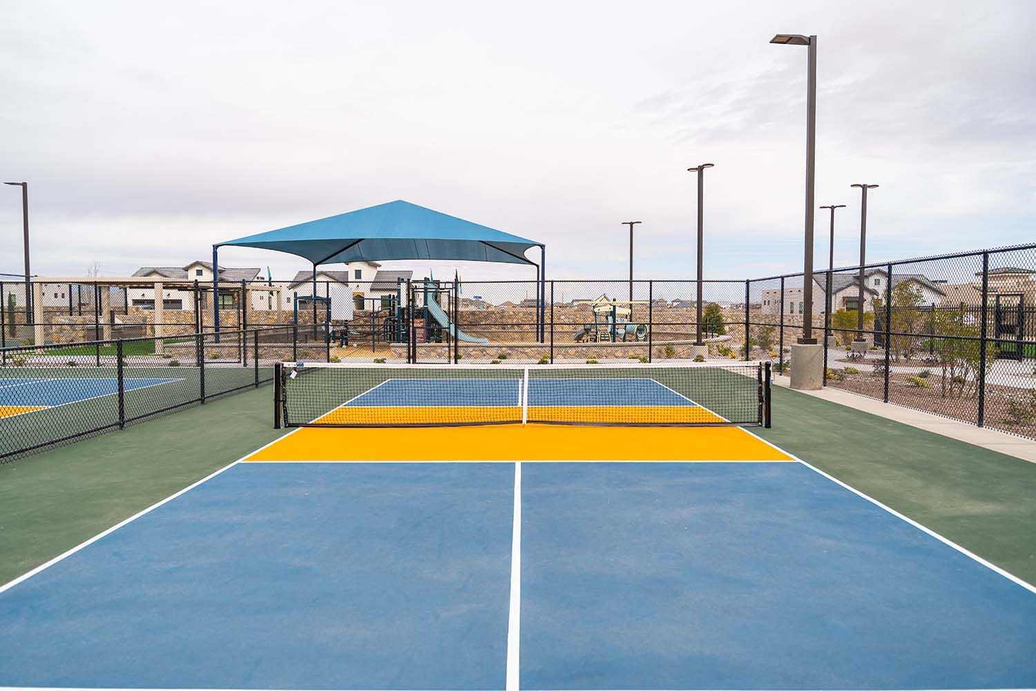 The Paseo del Este clubhouse and outdoor pickleball and tennis courts and gym  offer residents active lifestyle amenities in the Mission Ridge area.