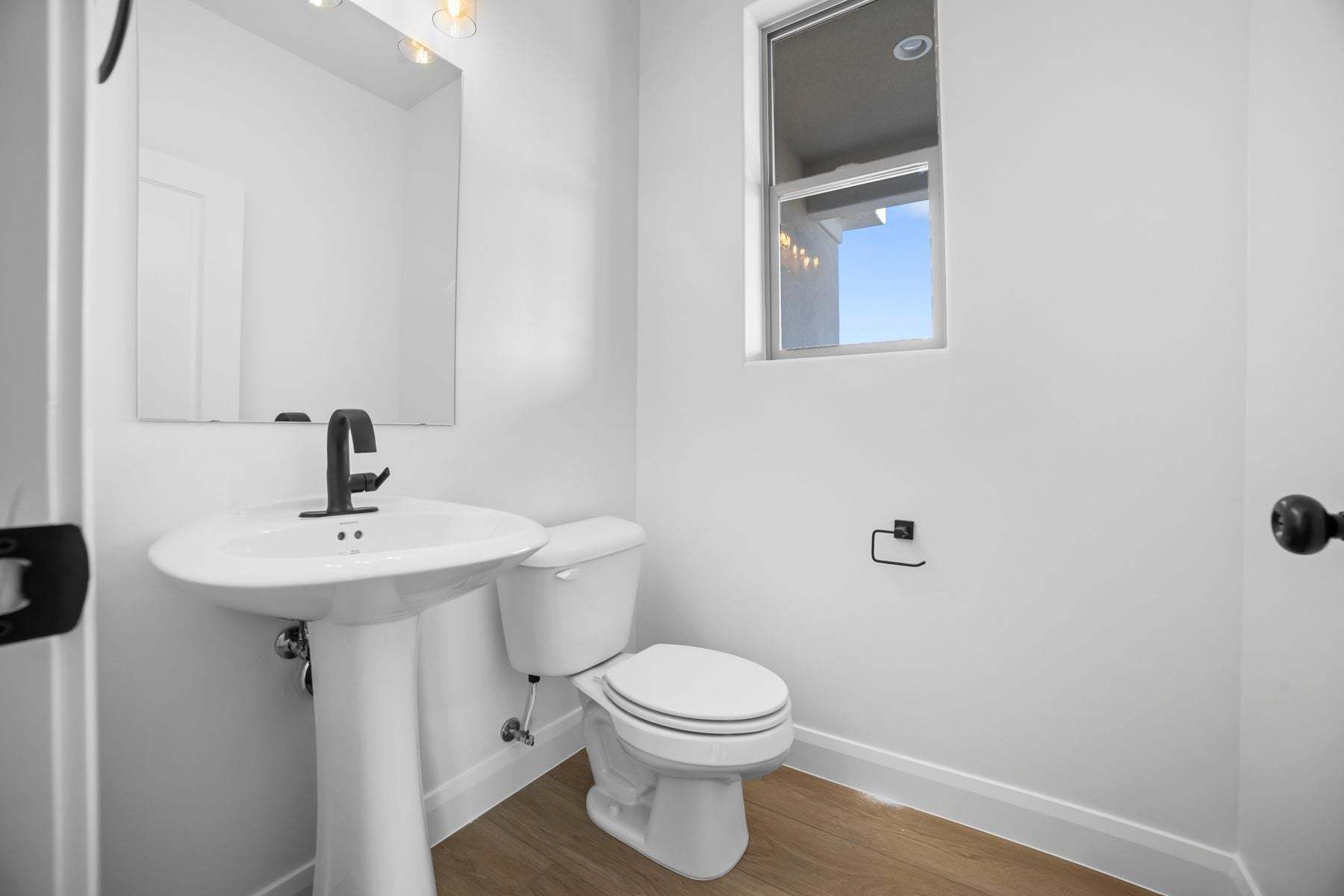 Half Bath at Entry *Finished home photos are representational images only. See sales agent for detai