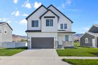 The Village at Fox Meadows - Smithfield por Visionary Homes en Logan Utah