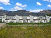 Ridgeline Park - Nibley (Townhomes) por Visionary Homes en Logan Utah