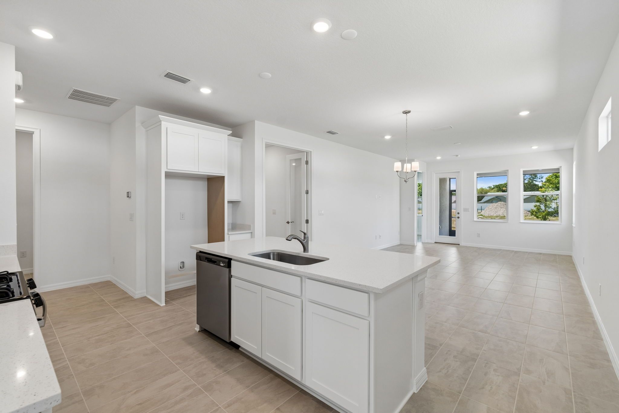 Sandpiper new construction luxury paired villa home plan kitchen 55+ in Sun City Center, FL at Fairway Pointe by William Ryan Homes Tampa