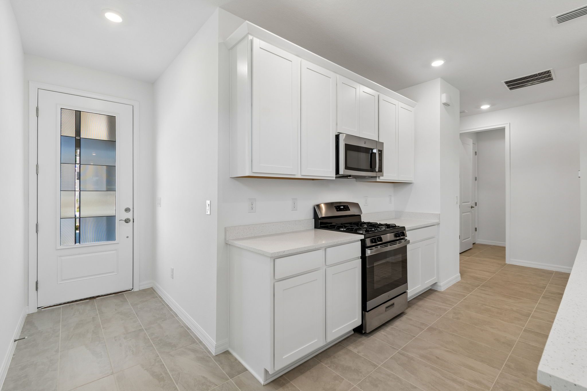 Sandpiper new construction luxury paired villa home plan kitchen 55+ in Sun City Center, FL at Fairway Pointe by William Ryan Homes Tampa