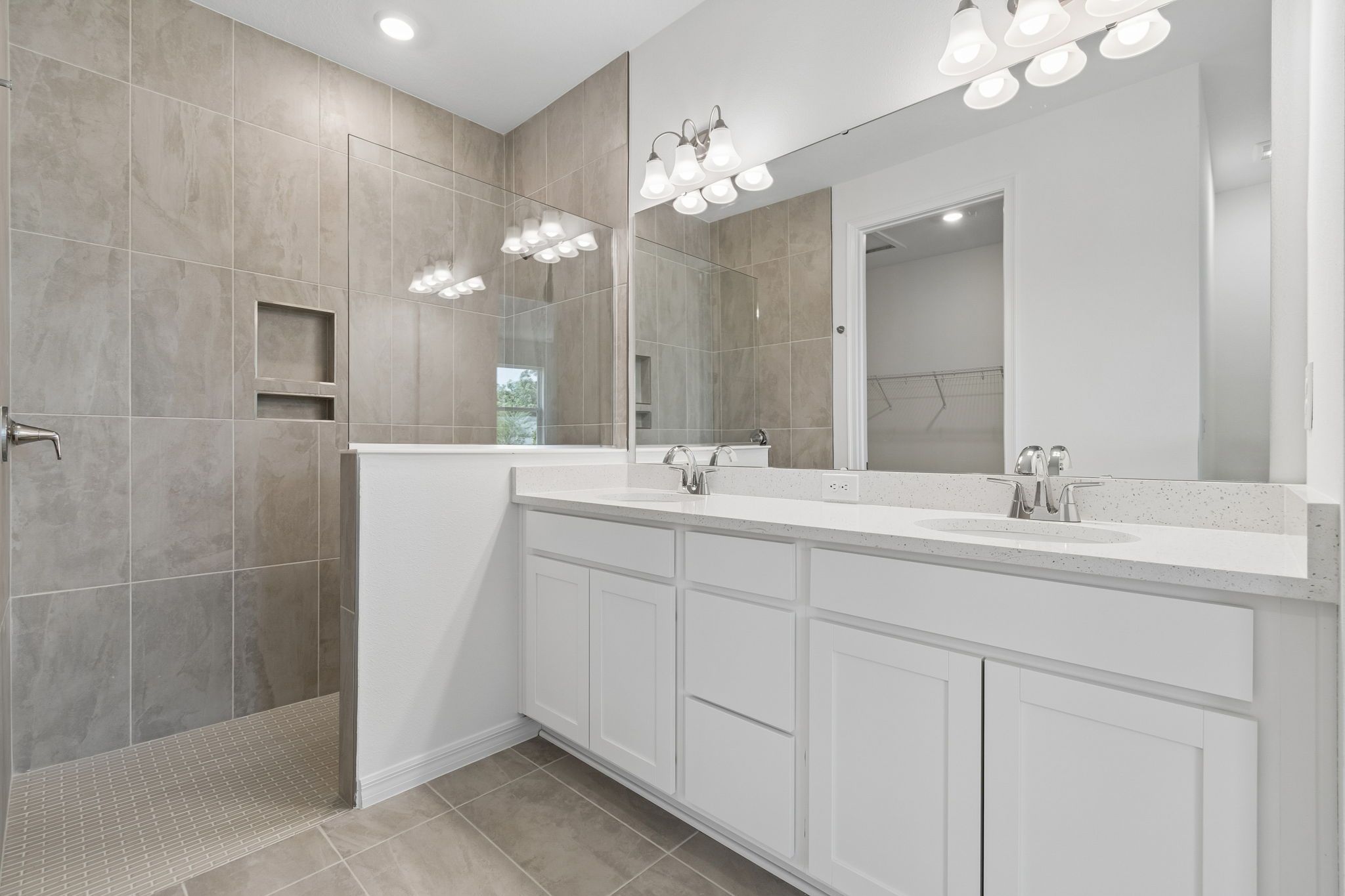 Sandpiper new construction luxury paired villa home plan primary bath 55+ in Sun City Center, FL at Fairway Pointe by William Ryan Homes Tampa