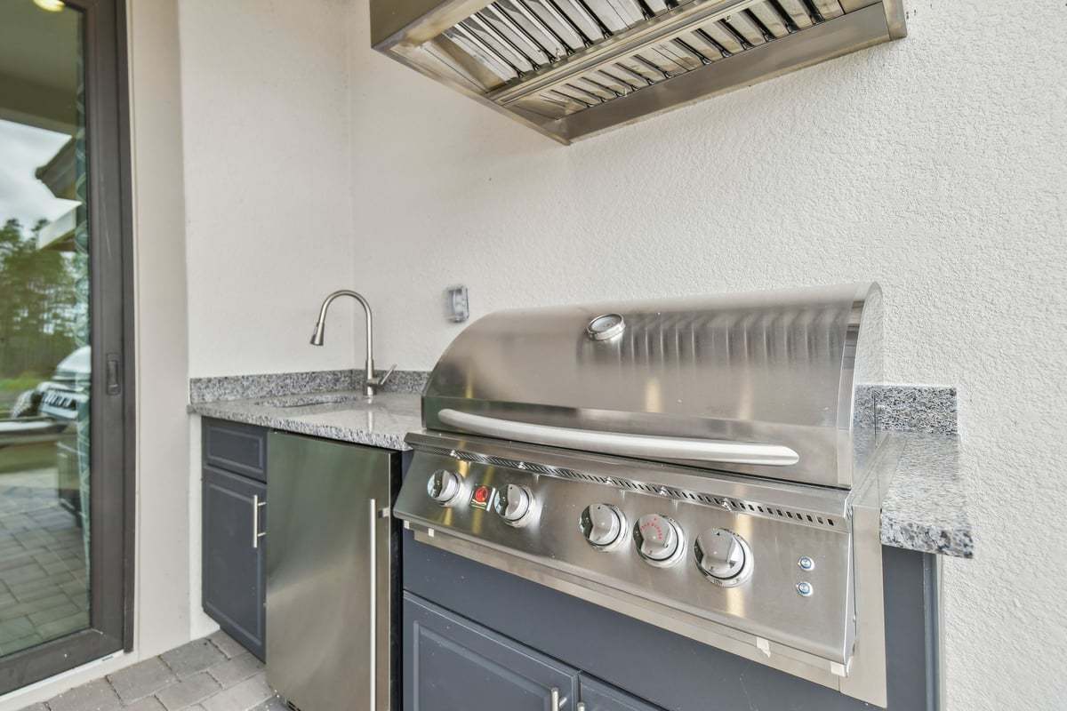 Sweetwater back patio with outdoor kitchen