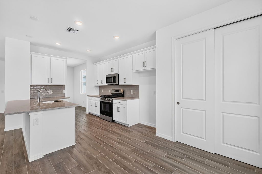 juno kitchen with doorway to dining