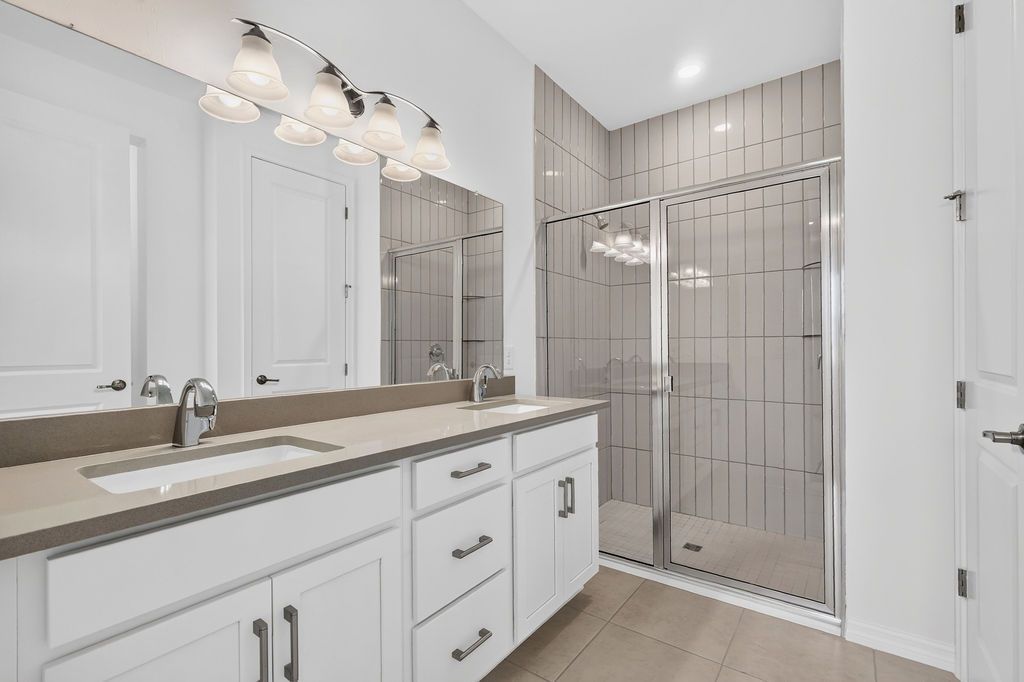 juno primary bathroom dual vanities walk in shower