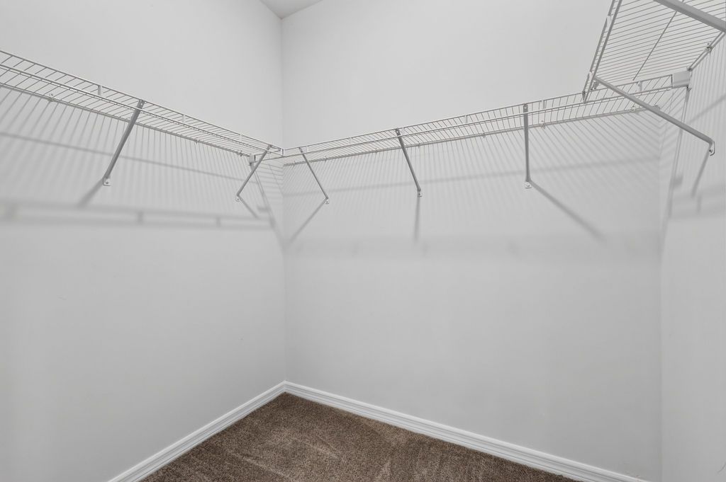 juno primary bedroomom walk in closet