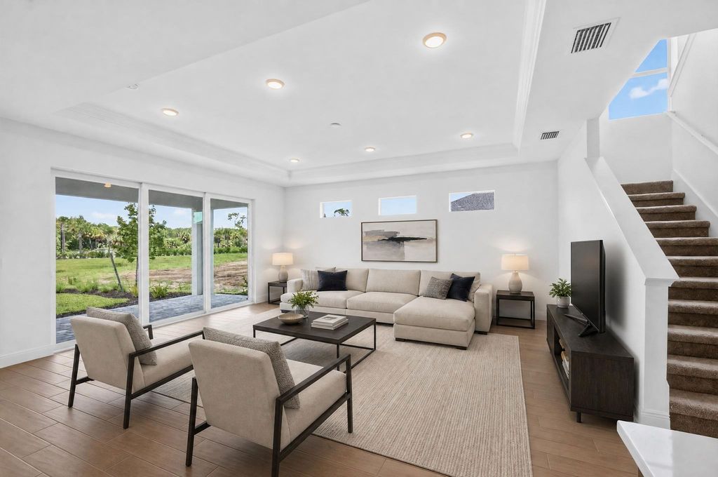 Sebastian Open Concept Living Room With Sliders