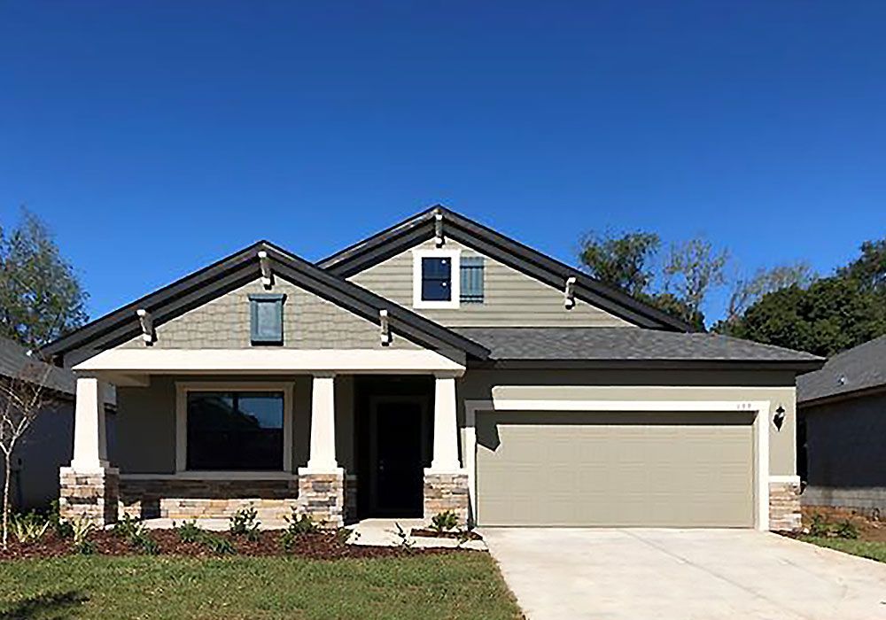 Sweetwater Craftsman style elevation with stone new home front exterior William Ryan Homes Tampa
