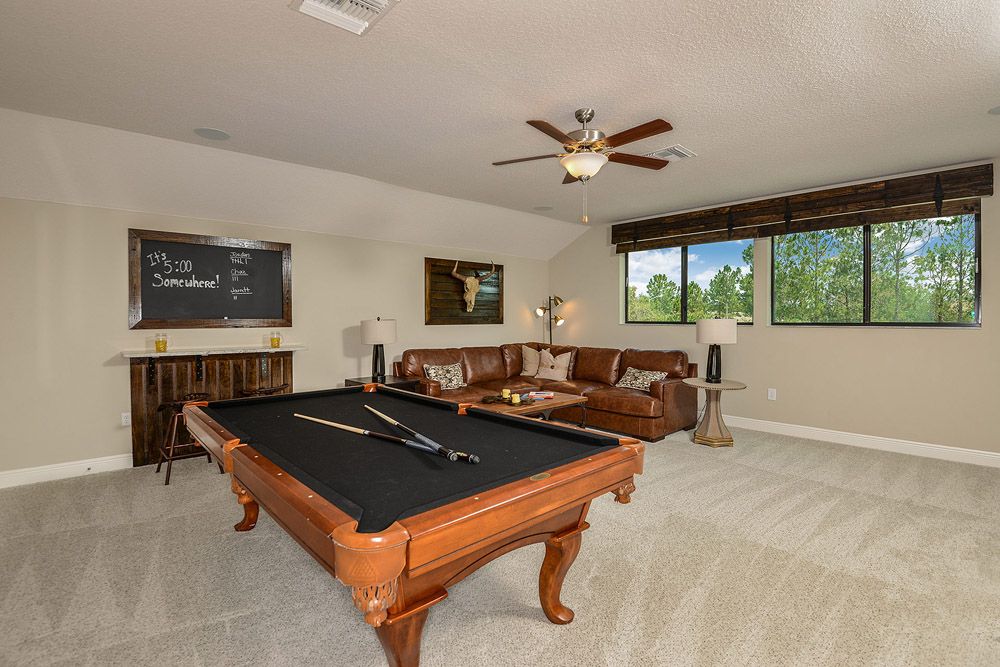 Joyce model home second floor optional bonus room staged as game room by William Ryan Homes Tampa