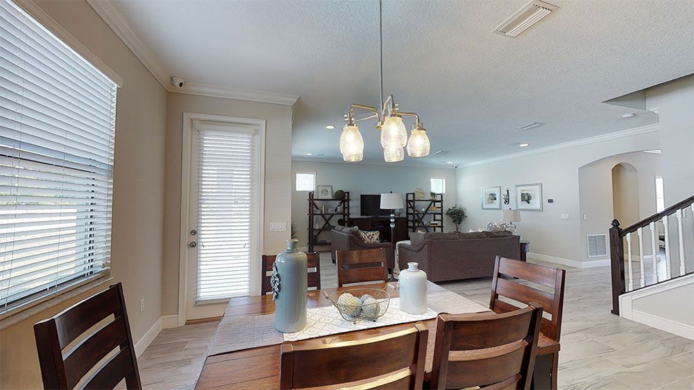 Juniper-FL Model Home - Casual Dining Area - Overlooks Family Room + Convenient Door to Lanai