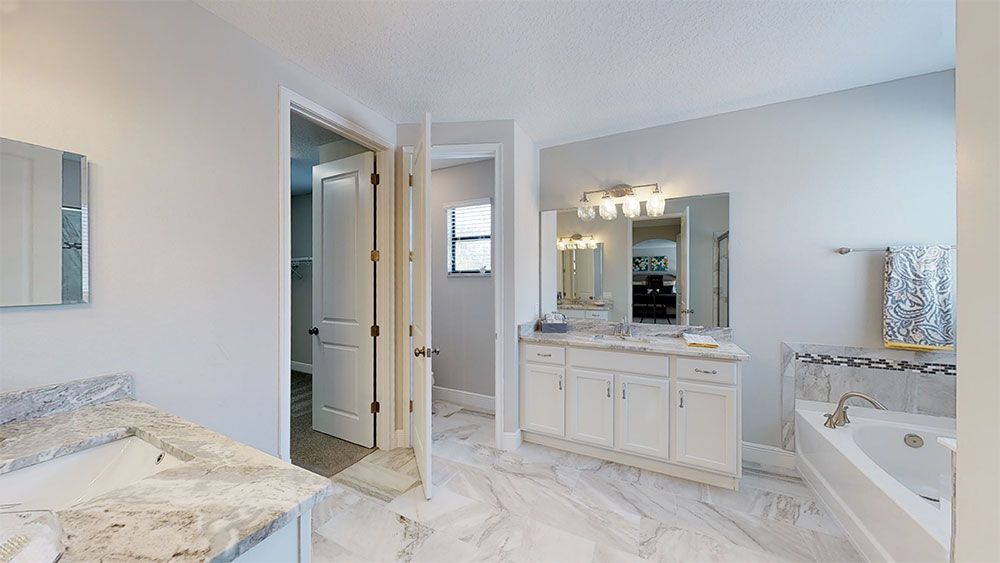 Juniper-FL Model Home - Spa-Worthy Master Bath with Separate Vanities, Tub, and Shower