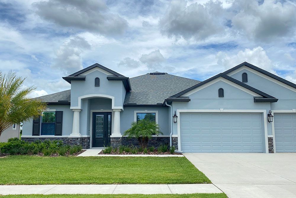 Joyce Tuscan elevation with optional stone new home front exterior William Ryan Homes Tampa