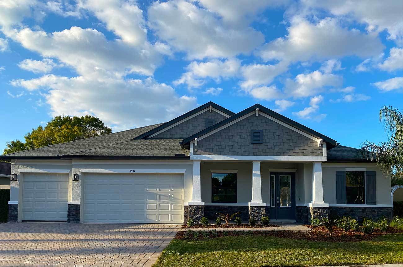 Joyce Craftsman elevation with stone available at Whiting Estates new home construction by William Ryan Homes Tampa current model home at La Paloma