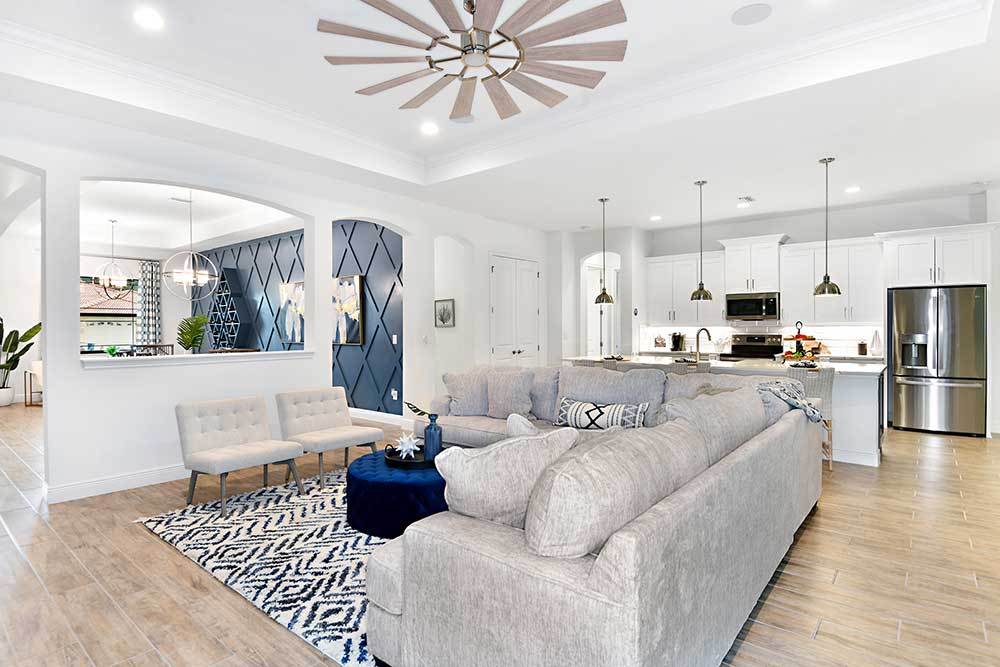 Joyce model home great room dining room and kitchen by William Ryan Homes Tampa