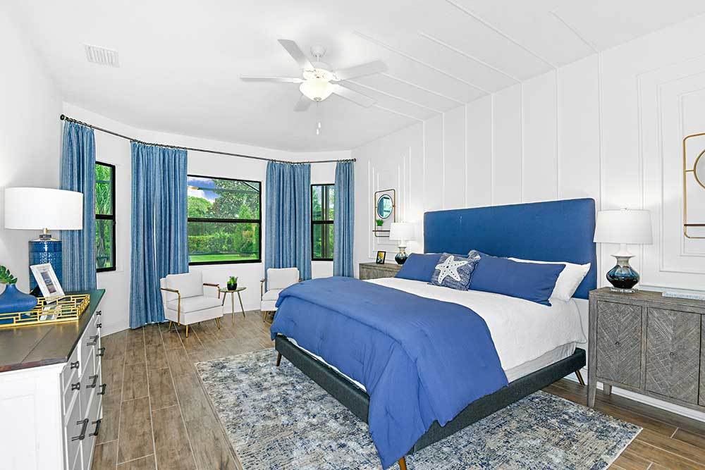 Joyce model home owners bedroom with Bay window seating area option by William Ryan Homes Tampa