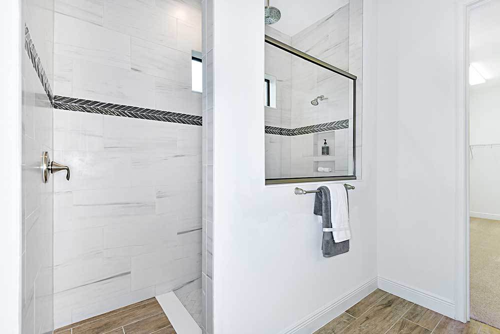 Joyce model home owners bathroom walk in shower by William Ryan Homes Tampa